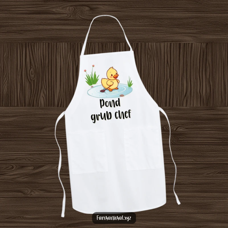 Funny duckling apron showing a happy duckling paddling energetically in a pond, ideal for kitchen protection with a humorous and cheerful farm twist.