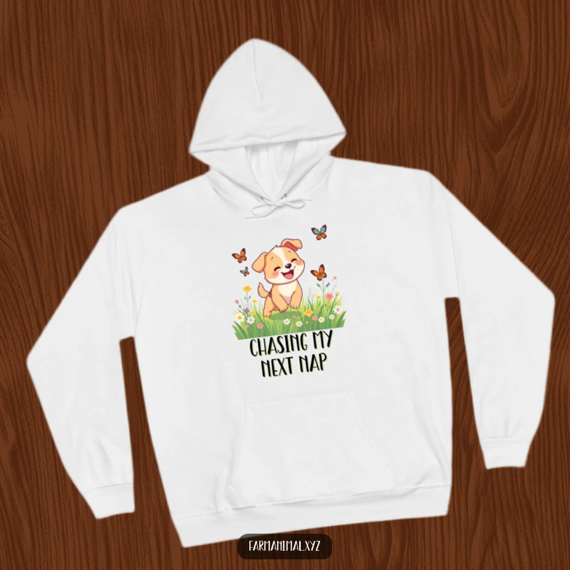 Funny happy dog chasing butterflies in a meadow on a cozy hoodie, a heartwarming and humorous design.