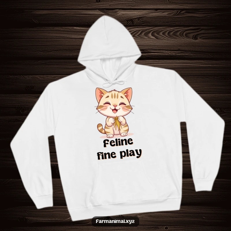 Funny Barn Cat Hoodie showing a smiling cat batting playfully at hay, offering warmth and a touch of humorous farmyard cuteness.