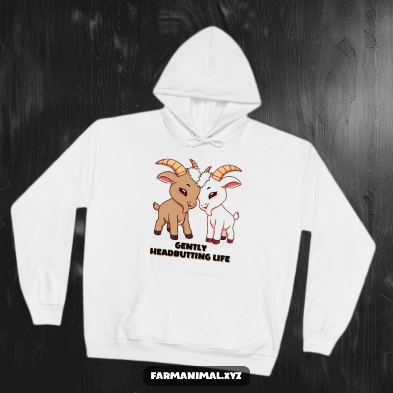 Funny goats locked in a playful headbutt on a hoodie, a humorous and warm piece of apparel.