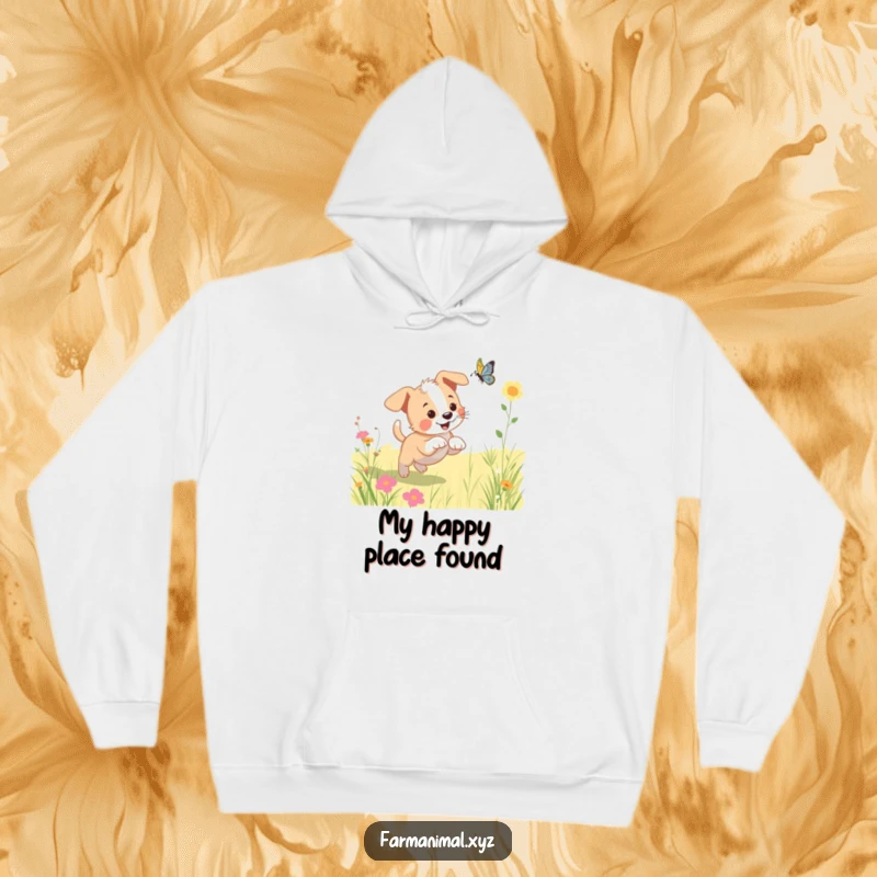 Funny puppy hoodie depicting a playful dog on a delightful butterfly chase in a sunny meadow, full of innocent joy.