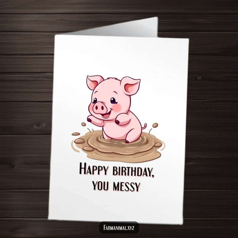 Funny Free Printable Birthday Card showing a pig gleefully splashing in a mud puddle, celebrating with messy joy.